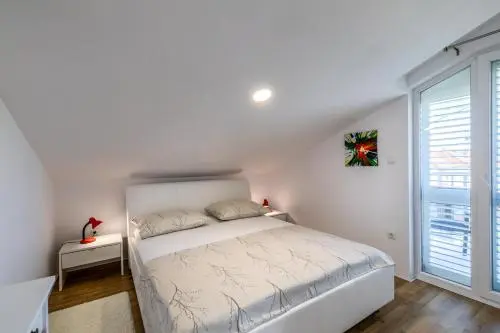 Master bedroom with balcony access